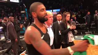 Kyrie Irving gives his shoes \& jersey to veterans that were on the crowd