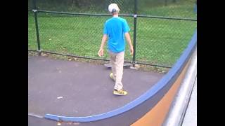 ollie to kickflip on halfpipe