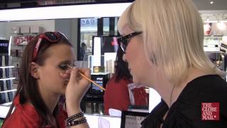 How synchronized swimmers apply (and keep on) their makeup