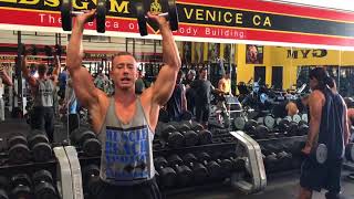 Shoulder presses at Golds Gym Venice