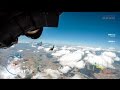 Flying wing-suit clouds 4k GPS