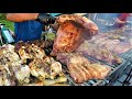 Street Food Fest in Milano, Italy. Burgers, Grilled Meat, Fried Pizza, Pasta, Cheese and more