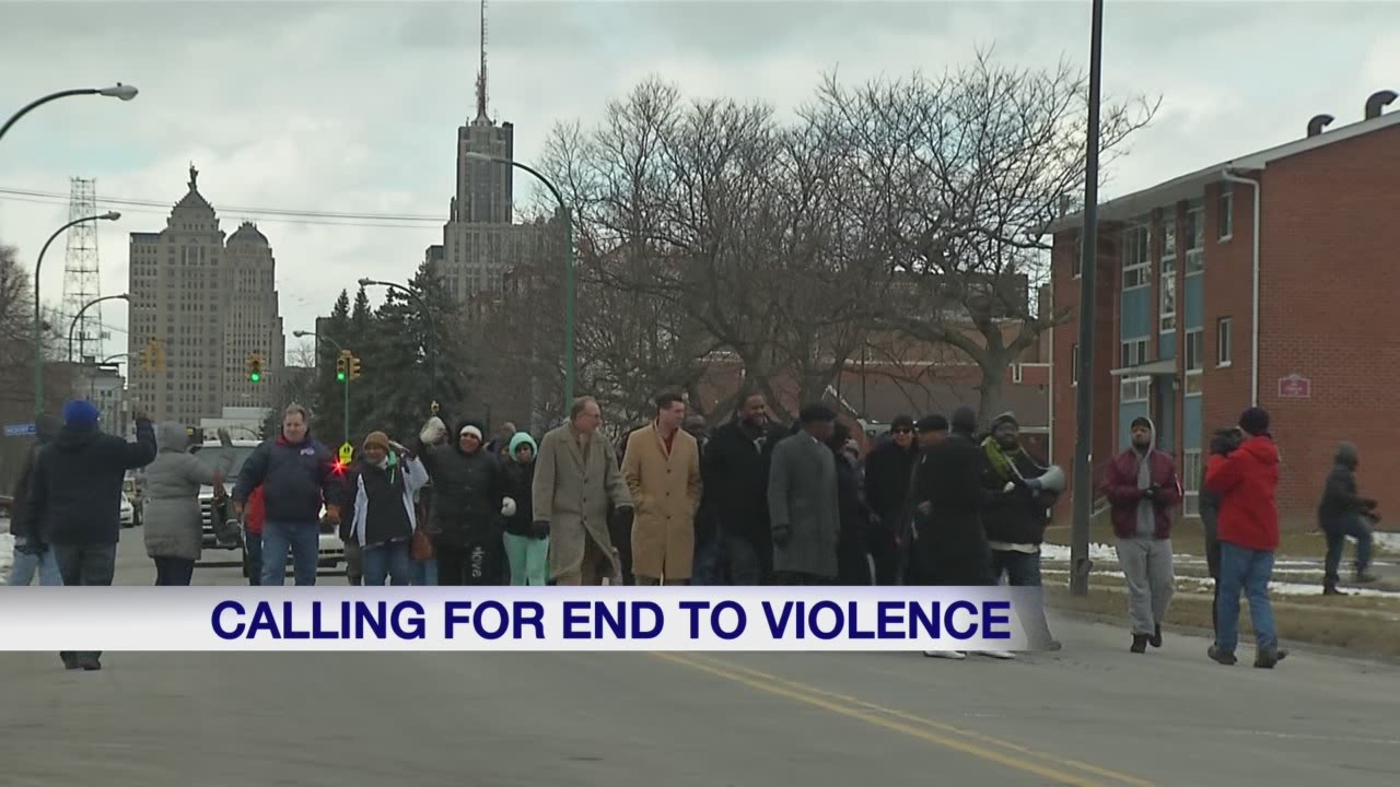 Community members walk to end violence in Buffalo - YouTube