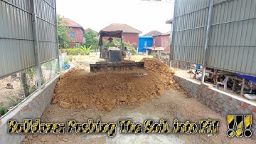 Bulldozer pushing the soil down into pit under home ! complete ! mitsubishi bd2g dump truck working