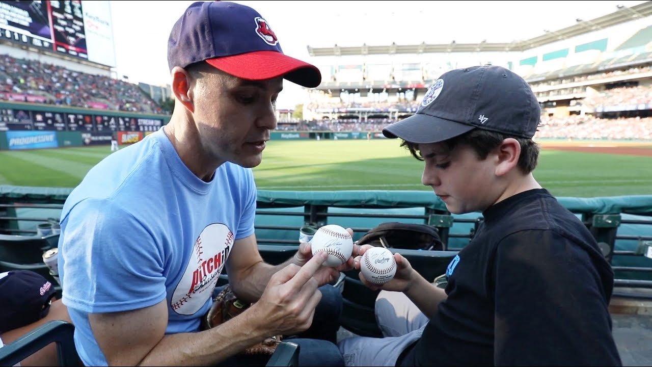 Helping a kid catch baseballs at Progressive Field YouTube