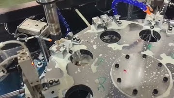 Automatic drilling machine with chamfering and tapping 