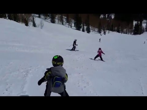 Zach and Maya skiing down Tomahawk in Steamboat 2