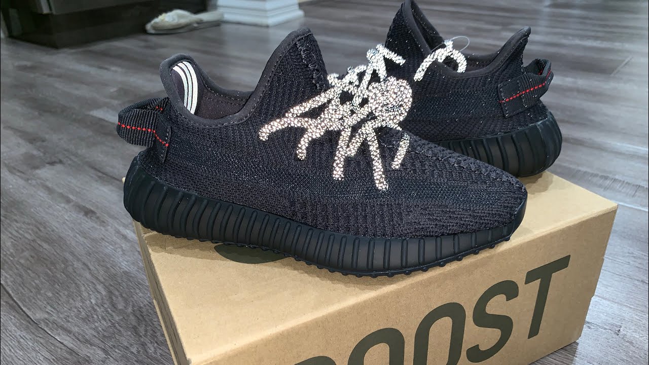 yeezy 350 black reflective on feet