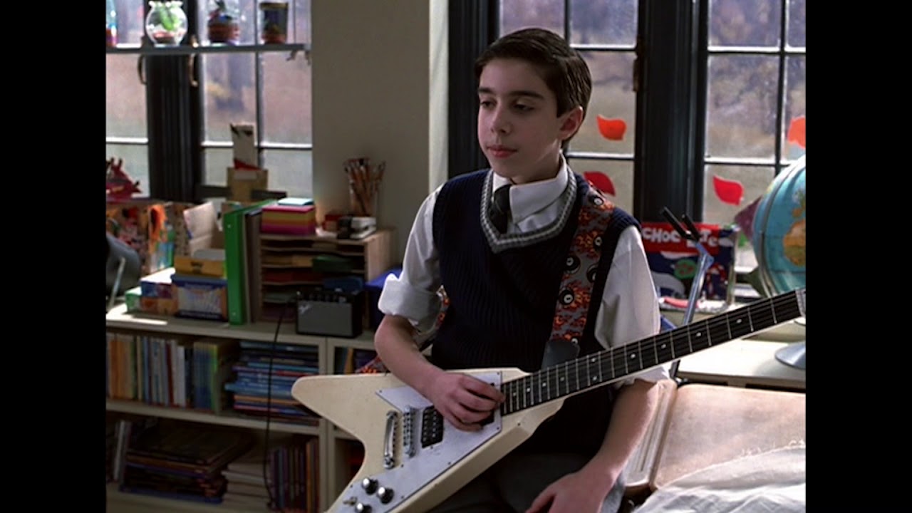 In School of Rock, after being kicked out of his rock band, Dewey Finn (Jack  Black) becomes a substitute teacher of an uptight elementary private  school