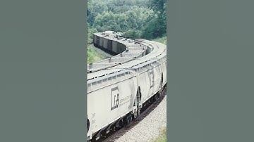 Northbound and southbound CSX trains pass each other in the S curve at Nortonville, Ky.