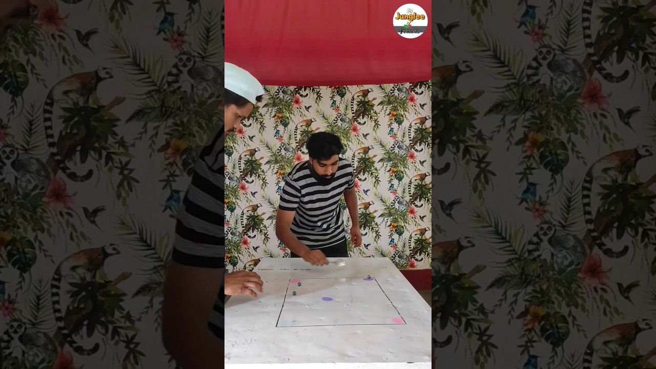 balance (कंचा) with spoon on table 