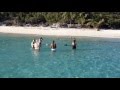 Kobi swims with wild pigs at sandals emerald bay great exuma bahamas