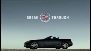 Cadillac commercial in desert, music by Led Zeppelin.  XLR Convertible featured at the end. 2004?