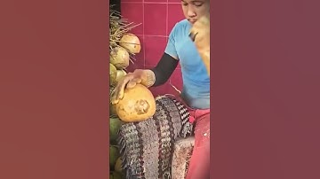 easy techniques and skills for peeling coconuts using only a machete #shorts