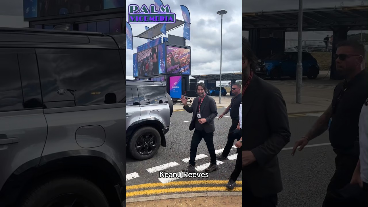 Keanu Reeves Waves At His Fans At F1 Event 
