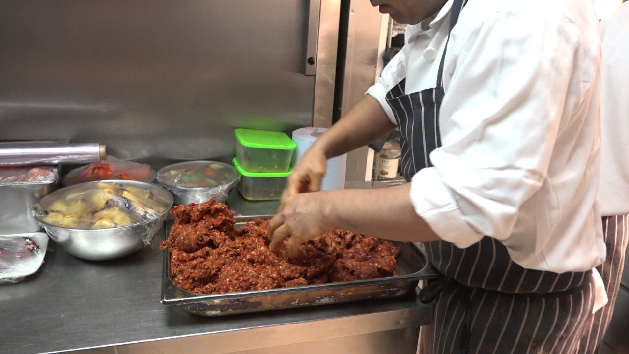 Making Seekh Kebab before placing on skewer at the Caraway Brasserie in Ilford YouTube