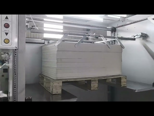SAGLIN DX-1207 automatic cardboard laminator running a factory acceptance test