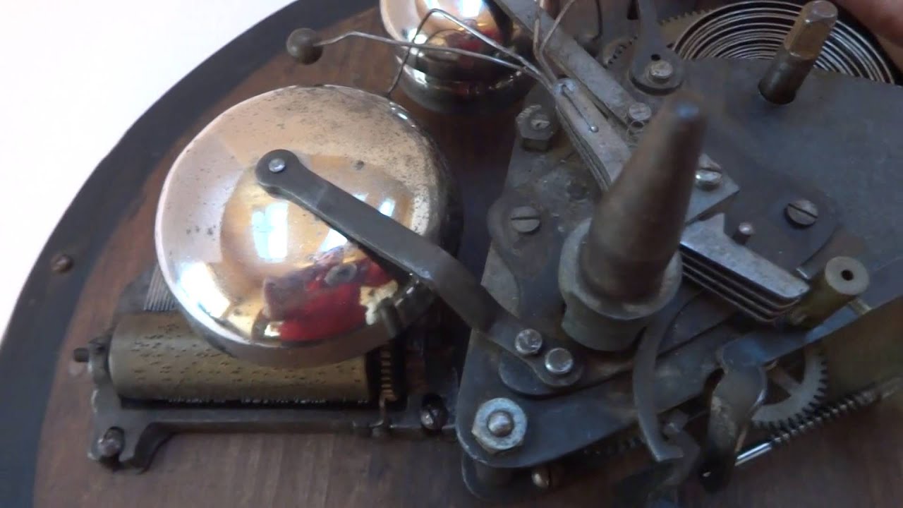 Antique musical Christmas tree stand with bells