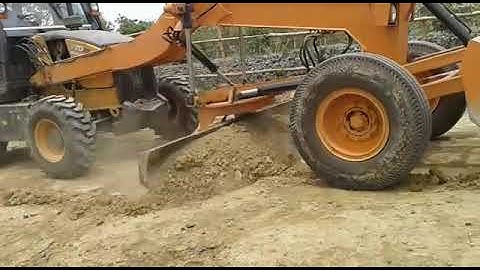 Grader attachment in loader backhoe