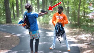 Reaching In My Bag Prank Infront Of Gangsters In HOOD GONE WRONG !