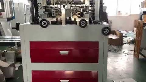 Automatic corner pasting machine for rigid box manufacturing