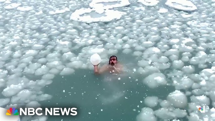 Chicago Man Takes Cold Plunge In Lake Michigan During Deep Freeze