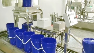 Pails filling caps lids automatic feeding pressing machine,paint bucket filler relleno de pintura