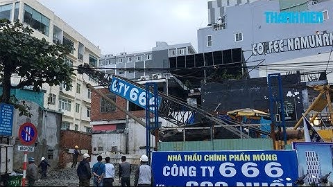 Hú vía vì cần cẩu đổ gục vào nhà dân