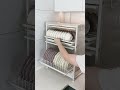 Multi-tiered kitchen storage rack #modernkitchen #kitchen #kitchencoach #kitchenstorage #trending