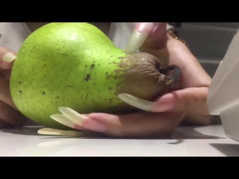 tang-tang-playing-with-pear-using-her-natural-long-nails-(video-12)