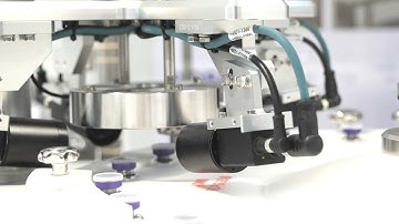 Vial print and inspection machine