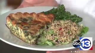 YUM! Mixed greens, caramelized onion and cheddar quiche