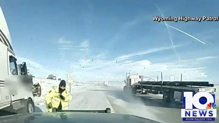 CLOSE CALL: Semi-truck loses control in snow, almost hits person