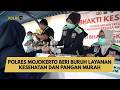 POLRES MOJOKERTO BERI BURUH LAYANAN KESEHATAN DAN PANGAN MURAH