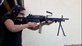 Off-hand shooting FN Minimi PARA