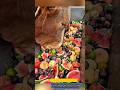 Farm animals enjoying a massive feast of sweet orange loquats and fruit