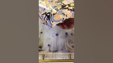 Layering an ebru marbled print over suminagashi #marbling #artsandcrafts #psychedelicart #papercraft