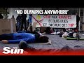 Paris 2024 store targeted: Anti-Olympics activists organize &#39;die-in&#39; protest