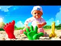 Video e giochi per bambini. La bambola Nenuco gioca con la sabbia. Tutti gli episodi