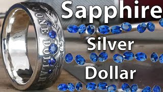 Flush setting Sapphires into a Morgan Dollar Coin Ring