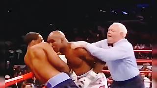 Pertarungan Cepat Evander Holyfield Babak Belur