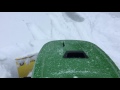 John Deere 758 plowing snow
