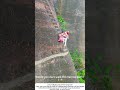 Woman Walks Cliff Edge with Carrying Pole – Path Narrower Than 30cm ⛰️🚶♀️