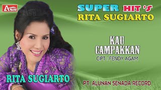 Video thumbnail of "RITA SUGIARTO -  KAU CAMPAKKAN ( Official Video Musik ) HD"