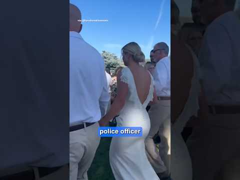 Bride has police officer who arrested her abusive father walk her down the aisle