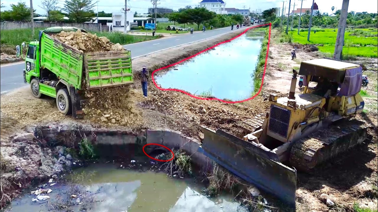 New Processing of Filling Rock Make a Road Through The Canal By KOMATSU D53P Bulldozer & 5ton Trucks
