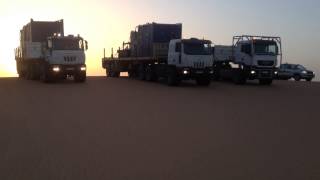 Schenker Rig move TA7 TA10 parking sur une dune a Taoudenni