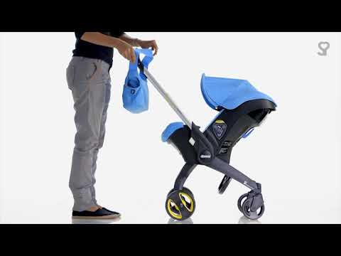 Как установить сумку на коляску Doona