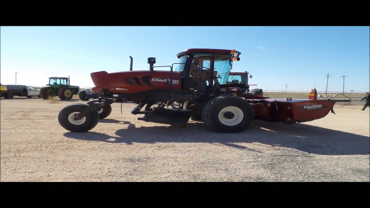 2014 MacDon M205 selfpropelled windrower for sale noreserve auction March 30, 2016