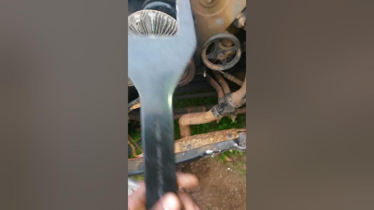 Removing fan clutch with removal tool wrench set - YouTube